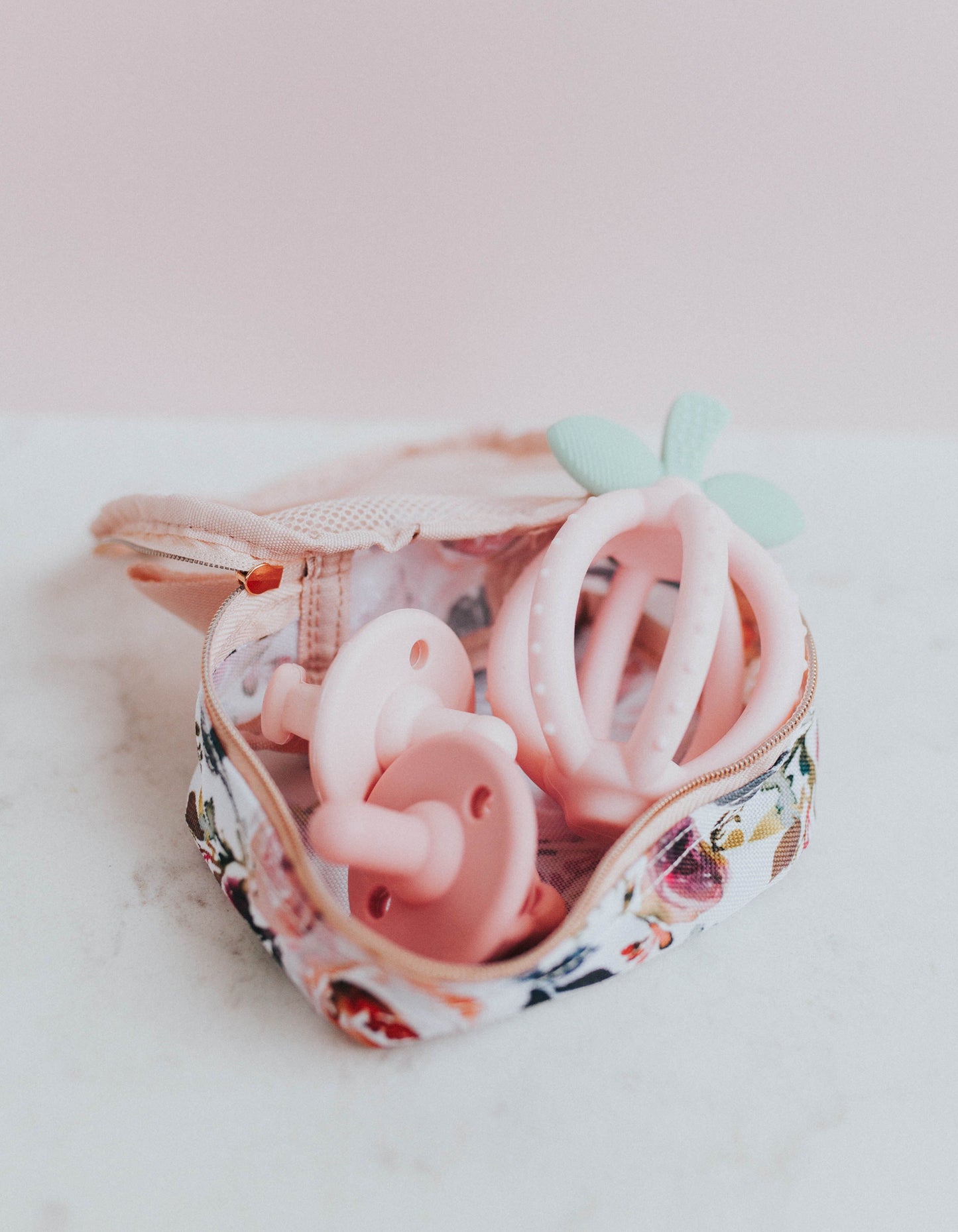 Bitzy Biter™ Teething Ball & Training Toothbrush (Pink Lemonade)